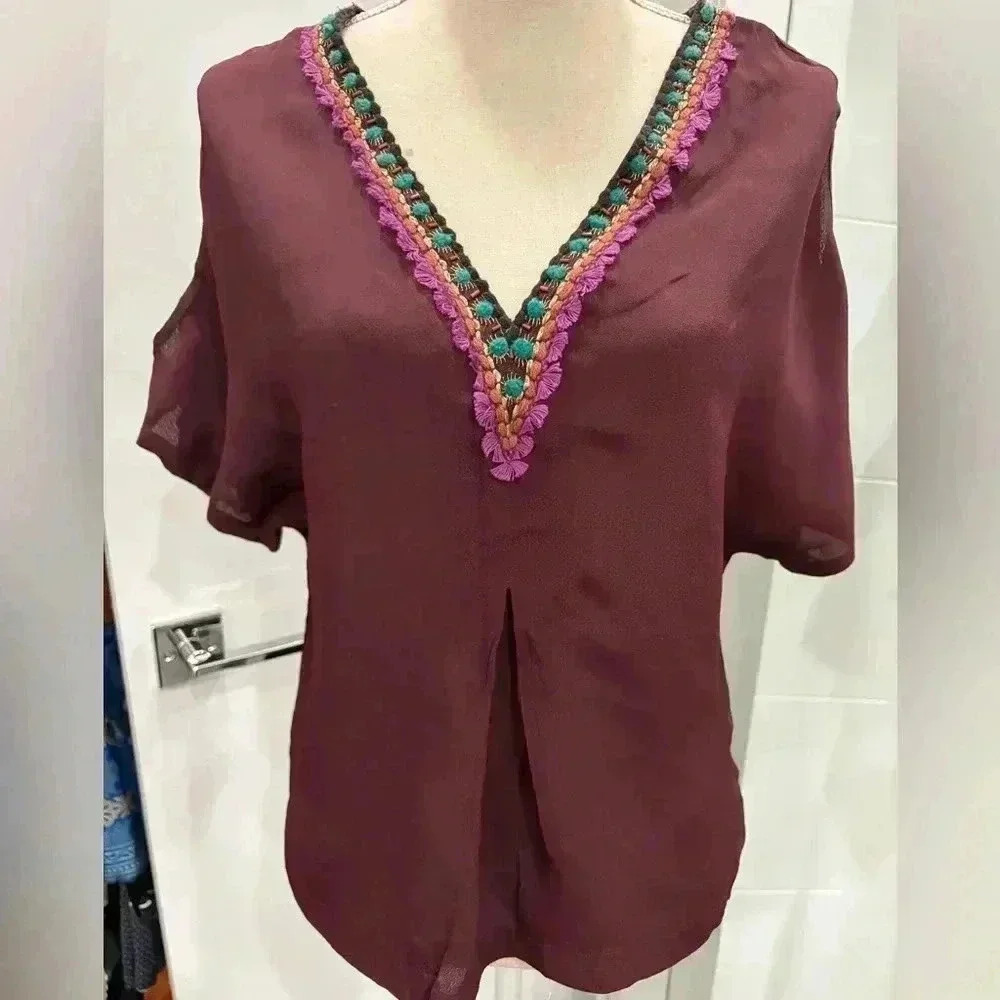 Unique Sz S Beautiful Multi color Burgundy top. Never worn.